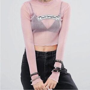 THE RAGGED PRIEST Dolls Kill Can’t Complain Long Sleeve Sheer Mesh Crop Top Pink